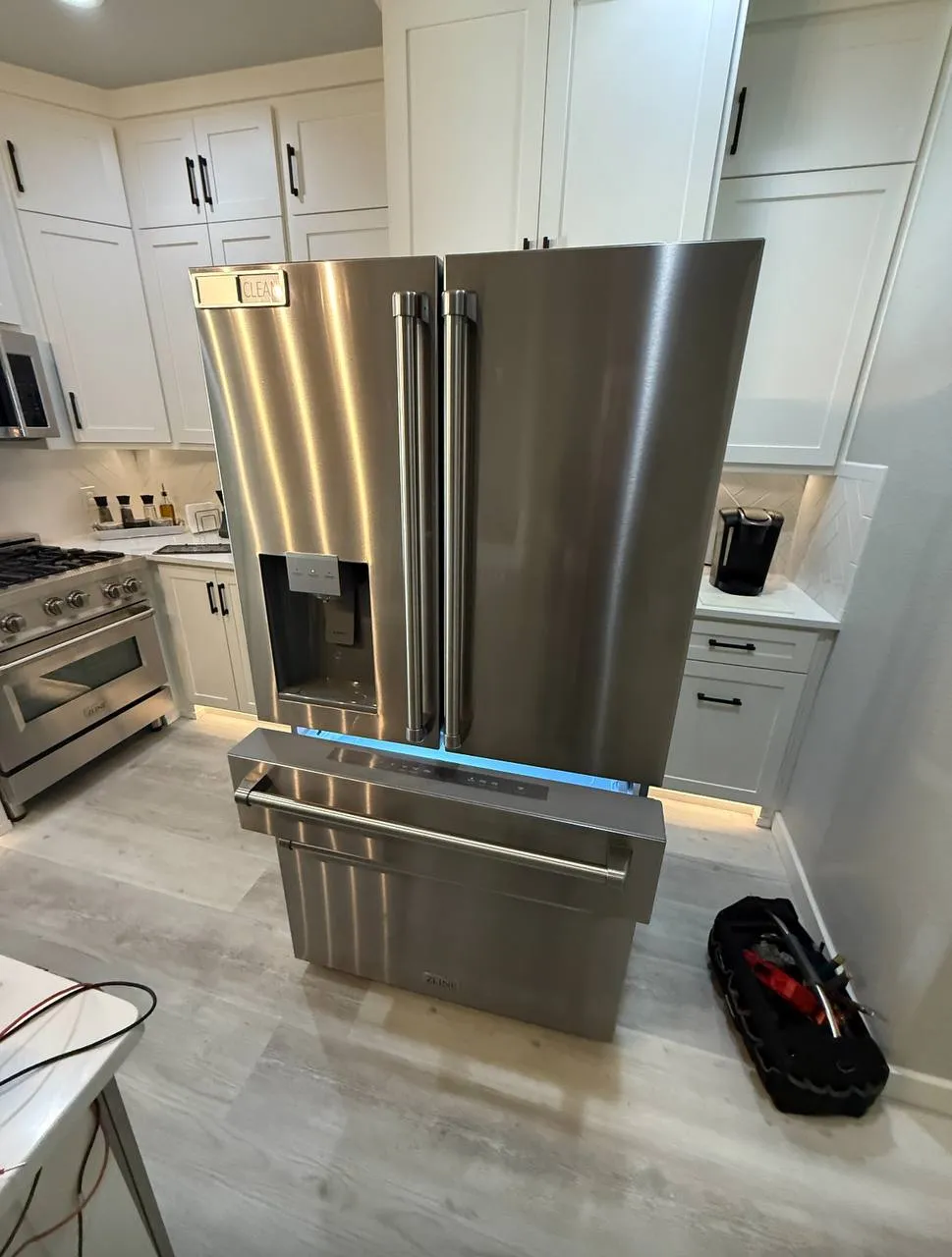 ProStar technician servicing a washing machine